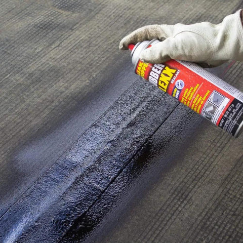 Applying Rubber Flexx Waterproof Repair Sealant Spray Point And Spray To Seal Cracks Holes Leaks Corrosion And More Black 18oz on a surface