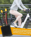 Dual Battery Parallel Connector For Electric Bikes 20V-72V DC Power Kit With XT60 Plug 40A next to an e-bike rider