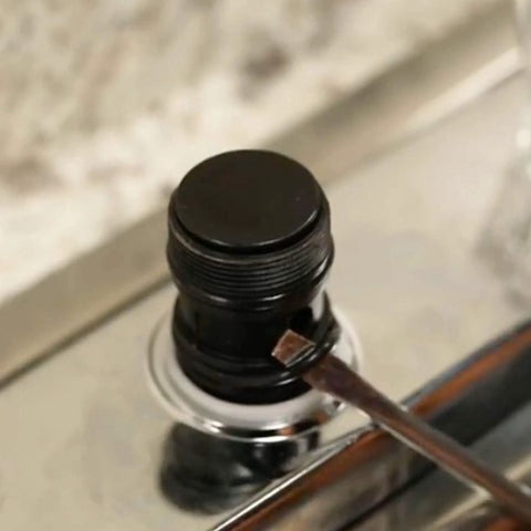 Close-up of faucet valve with Waterproof Silicone Faucet Grease For O Rings And Valves Plumbers Sealant Lubricant Half Ounce Pack