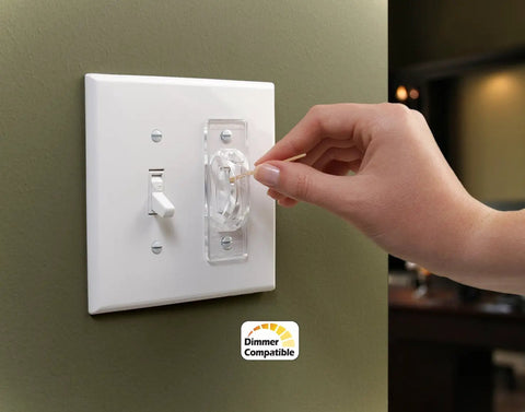 Person adjusting Light Switch Guards 3 Pack Toggle Style Kid Proof Safety Covers for Home and Office with two security levels.