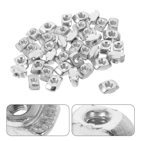 Kick Your 3d Printer Game Up With 40 Piece M3 T Slot Nuts Made From Tough Carbon Steel That Slide Smoothly Into Channels For Super Fast Mods And Upgrades On Your CNC Router Or Custom Builds - 40 M3 sliding nuts laid out, showing steel material and design details.