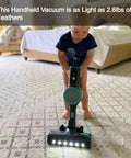 Child holding a lightweight Featherlight Cordless Stick Vacuum Sweeping Up Every Scrap With Muscle Bound 20000 Pa Suction And True HEPA Filtration.