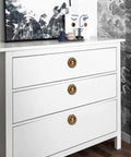 White dresser with 8 Pack 2 Inch Antique Brass Ring Drawer Pulls With Round Plate Base For Cabinets And Cupboards installed.