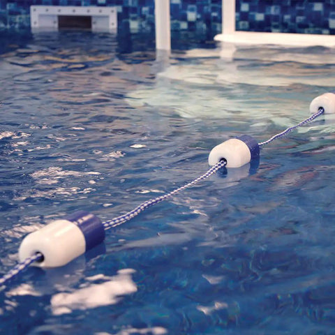 Premium Chrome Brass Pool Safety Rope Hooks With Set Screws For 3/4 Inch Divider Line and Float Kit in water, showcasing mounted safety line.