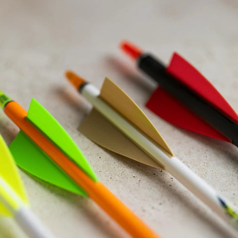 Closeup of High Profile 2.25 Inch Orange Arrow Vanes 36 Pack for Stable Flight Archery Fletching Vanes on arrows