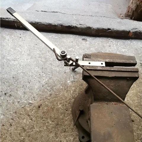 Heavy Duty Mini Tubing Bender And Rod Forming Tool For Stainless Steel Built To Bend Mild Steel Rods mounted on workbench