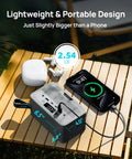 Ultra Portable Power Station 89.6Wh LiFePO4 Battery with phone and earbuds, outdoor table setup, 100W continuous, 200W peak