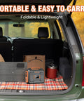 Portable Solar Generator 300W Power Station with Foldable 60W Solar Panel in car trunk for camping and outdoor use.