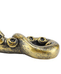 Close-up of Dope Octopus Resin Door Handle, Vintage Bronze Cupboard Furniture Pull in a steampunk style with textured tentacles.