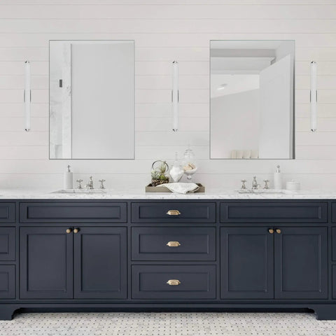Sleek 25 Inch Integrated LED Bathroom Light Fixture in Chrome, Dimmable from 15 to 100 Percent with ELV Dimmer Compatibility over mirrors.