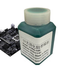 Bottle of Solder Mask Ink For Circuit Boards Green Epoxy, UV Curing Solder Protection Paste next to a circuit board.