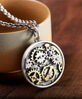 Vintage Style Compass Gear Pendant For Men Made From Real 925 Sterling Silver With Rustic Finish Unique Birthday Gift Piece close-up on wooden background.