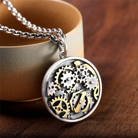 Vintage Style Compass Gear Pendant For Men Made From Real 925 Sterling Silver With Rustic Finish Unique Birthday Gift Piece close-up on wooden background.