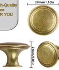 Heavy Duty Zinc Alloy Flat Round Drawer Pulls in a Pack of Twenty Red Antique Brass Knobs for Furniture Cupboards Dressers Wardrobes and Closets with Screws for Your Next Home Rig Project | Close-up view of 29mm antique brass drawer knob