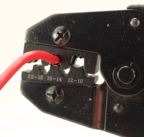 Close-up of crimping tool connecting wire for Weatherproof Automotive Relay Kit With 50 Amp Normally Open And 30 Amp Normally Closed Relays