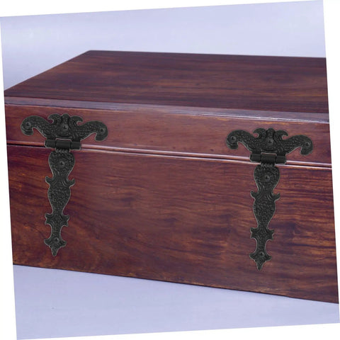 Set Of Four Retro European Style Wooden Box Hinges Built Tough For Durable Cabinet Hardware With No Sweat Installation Perfect For Diy Vintage Storage And Antique Furniture Restoration Projects on a wooden box.