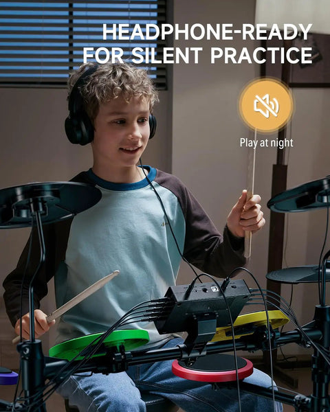 Child using Kids Electric Drum Set 7 Piece With Quiet Silicone Pads And 9 Inch Cymbals, 150 Sounds And 15 Kits for practice