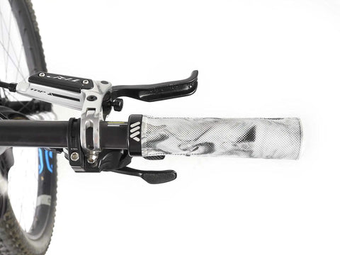 Berm Grips White Camo Dope Locking System 135mm MTB Grips With Tapered Diameter on a mountain bike handlebar