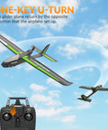 Stunt Ready To Fly 4 Channel RC Plane Ranger600 Glider with 2.4Ghz Control performing a u-turn in the sky with controller shown.