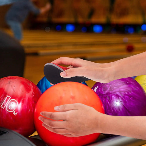 Hand using Six Piece Bowling Sanding Pads Set 2000 Grit For Bowling Balls, Resurfacing And Polishing Kit With Sponge