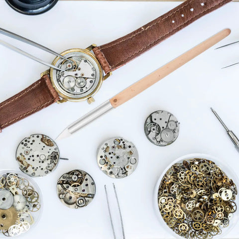 Ten Piece Pro Grade Watch Dial Cleaning Pens With Wooden Handles For Ultra Precise Movement and delicate part care shown with watch parts