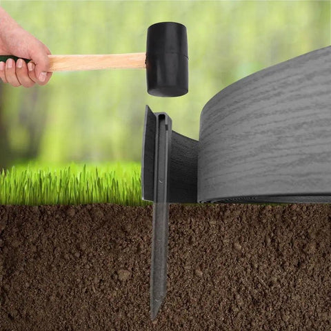 Installing 10 Ft Black Landscape Edging Coil Kit With 4 Inch High Terrace Board And Five 10 Inch Spikes for Easy Lawn Bordering