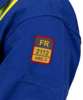Flame Resistant High Visibility Hi Vis Coverall In Royal Blue, 88 Percent Cotton And 12 Percent Nylon Twill, 7 Oz Workwear Built For Tough Jobs, Arc Flash Rated 12 Cal Per Cm2, NFPA 2112, HRC 2 Certified, Size Large shown with patch detail