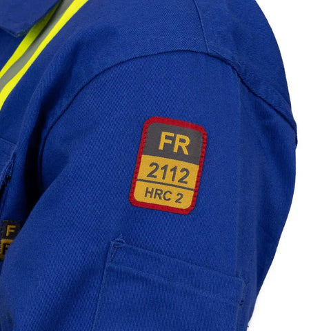 Flame Resistant High Visibility Hi Vis Coverall In Royal Blue, 88 Percent Cotton And 12 Percent Nylon Twill, 7 Oz Workwear Built For Tough Jobs, Arc Flash Rated 12 Cal Per Cm2, NFPA 2112, HRC 2 Certified, Size Large shown with patch detail