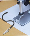 Six Piece Pro Grade Welding And Soldering Tool Flexible Arm Clamps With Built In Magnifying Lamp Base on workbench