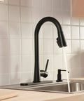 Precept Pull-Down Kitchen Faucet, 1.5 GPM, Matte Black Finish in a kitchen setting, with optional deck plate and soap dispenser.