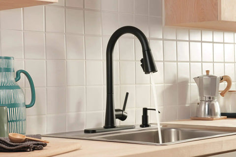 Precept Pull-Down Kitchen Faucet, 1.5 GPM, Matte Black Finish in a kitchen setting, with optional deck plate and soap dispenser.