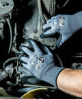 Precision Grip Cut Resistant Work Gloves For Tough Jobs With Textured Nitrile Coating For Wet Dry And Oily Surfaces in use