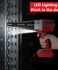 Cordless Rivet Gun Tool For M18 18V Battery Systems Red compact tool illuminating metal for fast rivet work in dark areas.