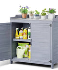 Outdoor Potting Bench With Metal Tabletop And Double Doors Cabinet, showing open cabinet with gardening supplies