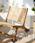 Heavy Duty Square Rubber Caster Cups 2X2 Inch Non Slip Furniture Stopper Glides under a wooden chair in bright room.