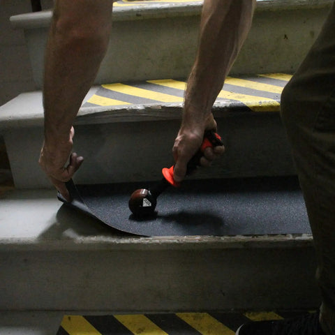 Applying No Slip Grip Tape Roll 12 Inch Wide Self Adhesive Traction Tape With Silicon Carbide Grit on indoor stairs
