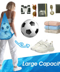 Set Of 2 Oversized Mesh Gear Bags 19 By 27 Inches In Black And Blue Drawstring Net Storage For Diving Snorkeling Fins Swim Gear Beach Gear And Sports Balls; blue bag worn with sports items and soccer ball visible.