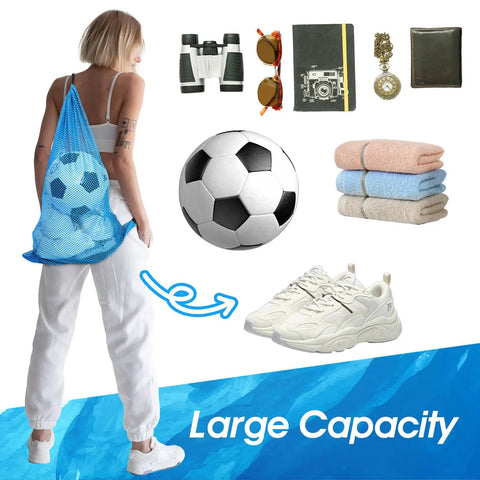 Set Of 2 Oversized Mesh Gear Bags 19 By 27 Inches In Black And Blue Drawstring Net Storage For Diving Snorkeling Fins Swim Gear Beach Gear And Sports Balls; blue bag worn with sports items and soccer ball visible.