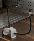 Helping Hands Soldering Table Clamp Dual Arm Third Hand Tool for PCB Holder with nonskid vise on workbench.