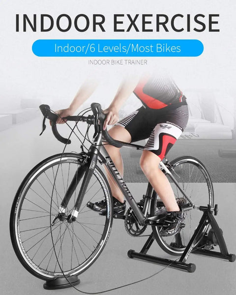 Person using All Weather Indoor Bike Trainer Stand With Magnetic Resistance For Home Gyms Fits 26 To 29 Inch And 700C Wheels
