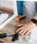 Folding table hinge replacement kit with tools on wooden desk for DIY furniture repairs.