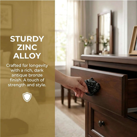 Hand opening a drawer with a 4 Pack 3 Inch Vintage Antique Brass Drawer Pulls With Dark Bronze Finish on a wooden dresser.