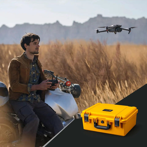 Man operating drone near yellow Waterproof PVC1 Hard Camera Case With Padded Dividers For Cameras Lenses And Dual Drones