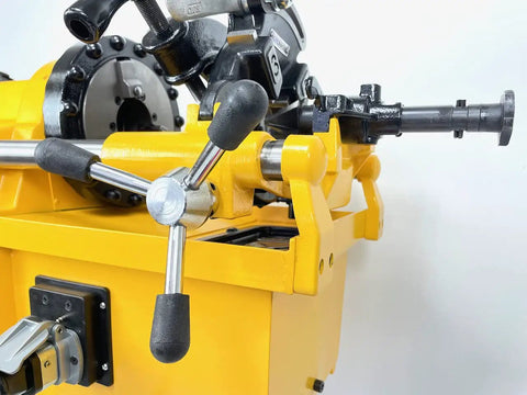 Bluerock Power PTM50-C Electric Motorized Pipe Threader Threading Machine close-up showing control levers and gear mechanisms.