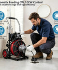 Heavy Duty Electric Sewer Auger And Drain Cleaner Machine Featuring 100 Ft Half Inch Steel Cable And 550W High Torque Motor in use for cleaning drain.