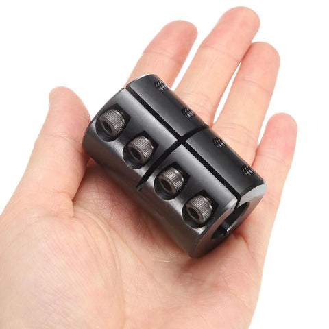 Rock Solid 5/8 To 5/8 Bore Shaft Coupling, 1-5/16 Inch Outer Diameter, 2 Inch Length, Black Oxide Plated, Single Split Clamping With 10-32 X 1/2 Inch Set Screws, Ideal For 3D Printer Motors And Drive Wheels, held in hand