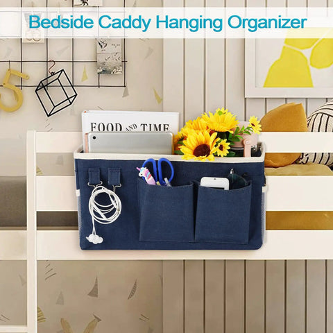 Bedside Caddy Hanging Organizer for Beds and Rails in navy canvas with pockets for phone, books, and accessories on bunk bed.
