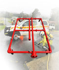 Heavy Duty Vehicle Chassis Cooling System With Multi Nozzle Fire Suppression Kit shown in action with red piping and firefighter.