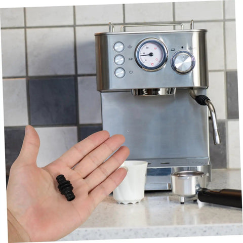 Hand holding rubber steam wand cover for espresso makers with heat insulation sleeve, steam wand protector for coffee machines
