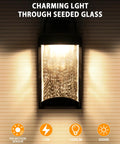 Motion Sensor Outdoor Wall Light With Integrated LED emitting warm light through seeded glass, 1200 Lumen, 13W, 3000K
